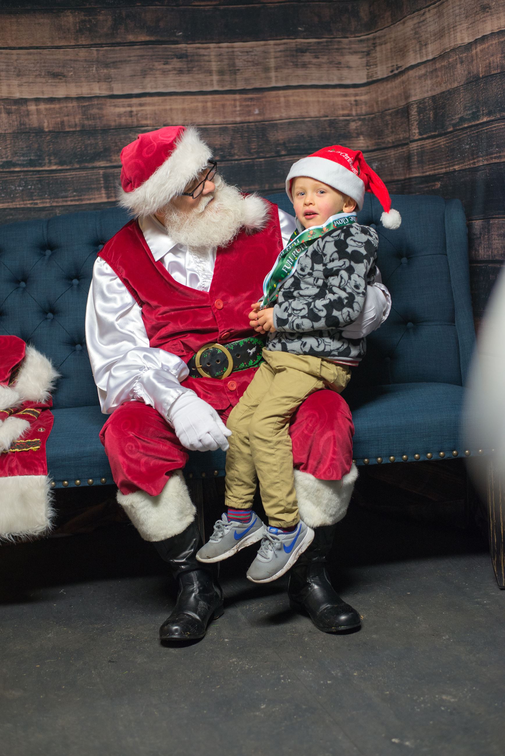 Santa Claus Talking to a Young Boy